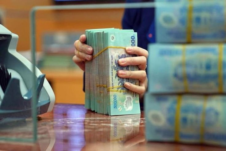 Tăng trưởng tín dụng cao đang tạo thêm áp lực lên bài toán lãi suất.jpg